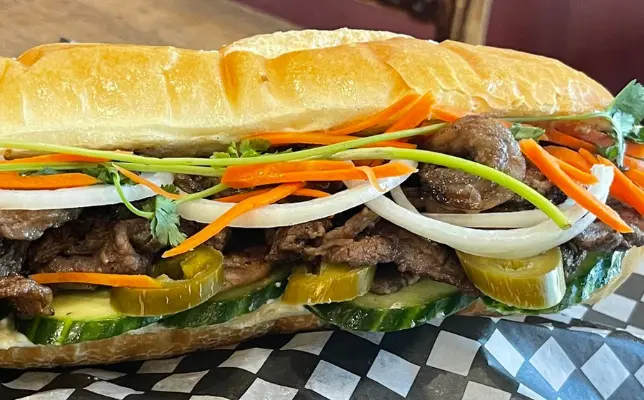 Kamayan Feast communal platter with crispy pork and seafood Calgary